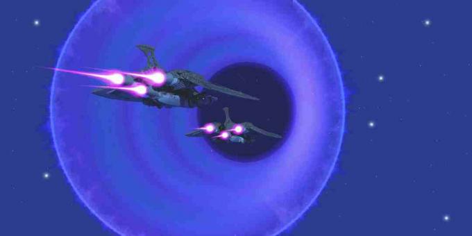 تصوير فني لسفينتين فضائيتين مقابل سماء ليلية زرقاء ، مع دوائر من الطاقة تصور ثقب دودي عبر الفضاء.